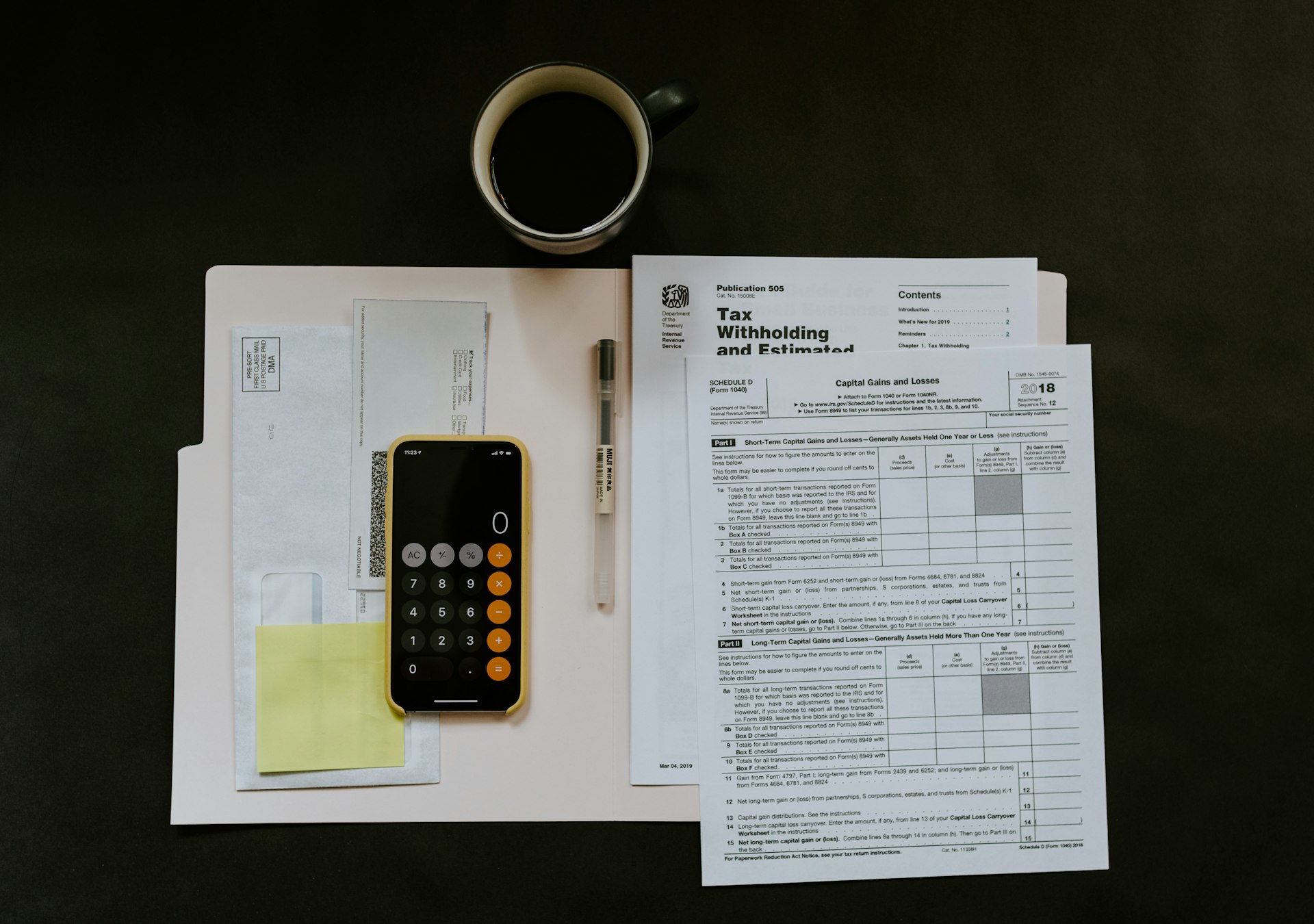 Accounting professional reviewing financial statements at a desk