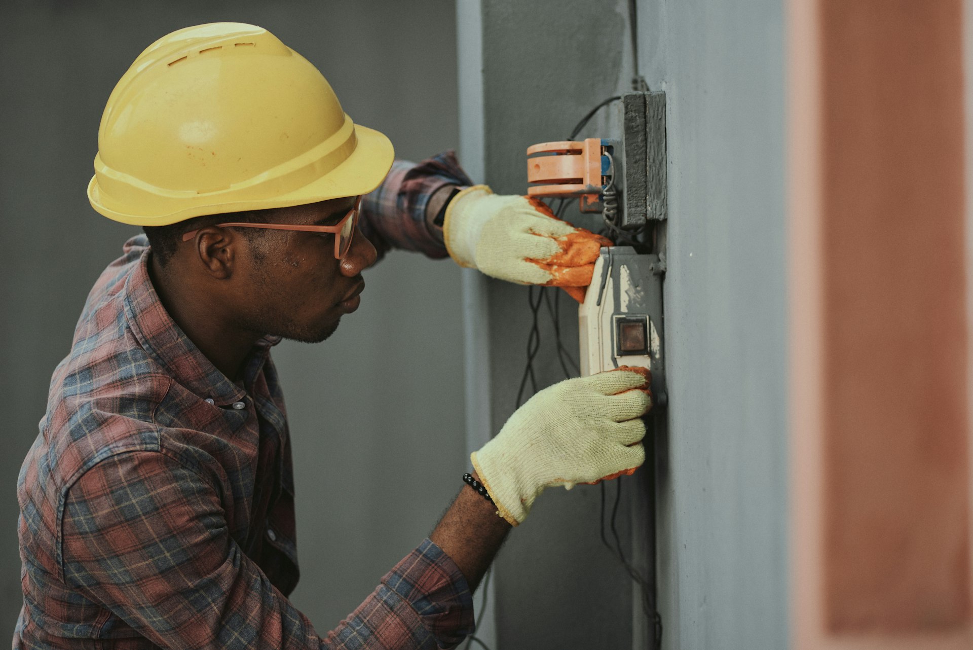 Electrician working on residential electrical panel